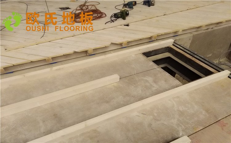 河北廊坊益田同文學(xué)校舞臺木地板項(xiàng)目-歐氏實(shí)木運(yùn)動地板